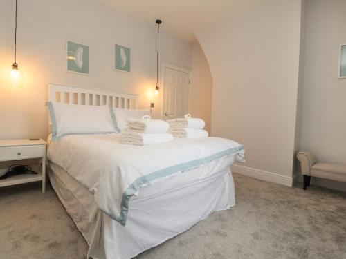 Ένα ή περισσότερα κρεβάτια σε δωμάτιο στο Acorn Cottage