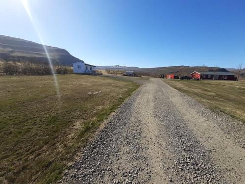 a dirt road in the middle of a field at Hagi 2 Road 62 nr 2 in Hagi