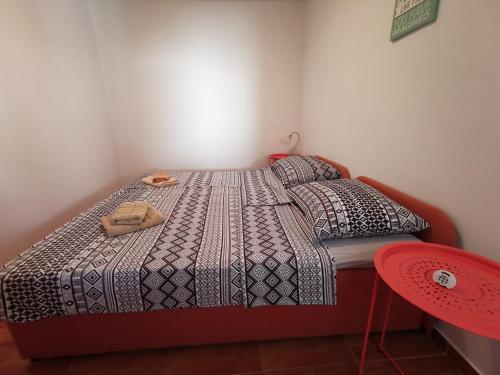 Ένα ή περισσότερα κρεβάτια σε δωμάτιο στο Apartmani Koin