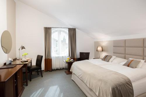 Postel nebo postele na pokoji v ubytování Boutique Hotel Bristol