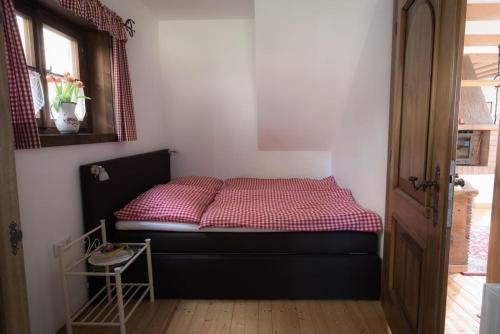 Una cama o camas en una habitación de Almhaus Anita