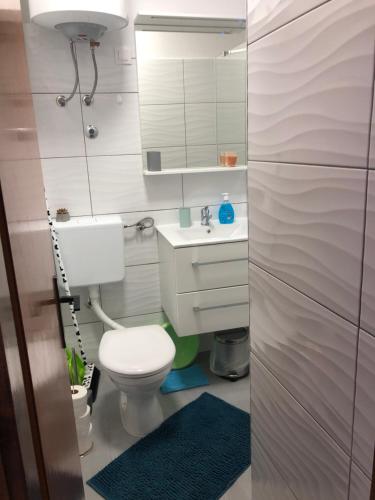 Kúpeľňa v ubytovaní Apartmani Roxy