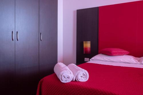 Cama o camas de una habitación en Orsola Apartments