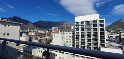 a view of a city with mountains in the background at Holiday Inn Express Cape Town City Centre by IHG in Cape Town