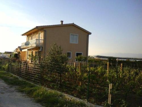 Fotografie z fotogalerie ubytování Holiday apartment in Privlaka with sea view, balcony, air conditioning, W-LAN 667-1 v destinaci Privlaka