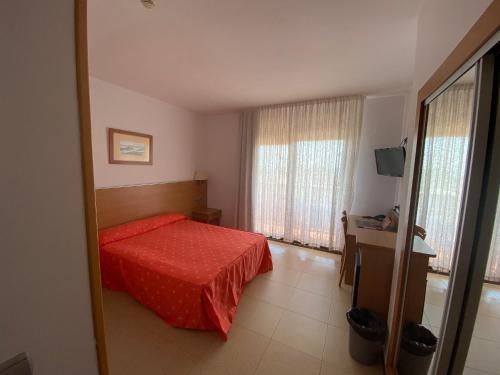 מיטה או מיטות בחדר ב-Hotel Vent de Mar