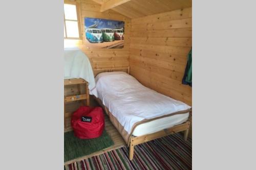 A bed or beds in a room at Authentic farmhouse (Söjtöry-Domonkos Ház)