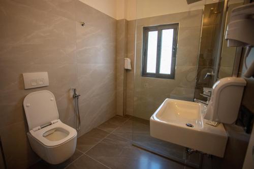 Koupelna v ubytování Hotel Kapri
