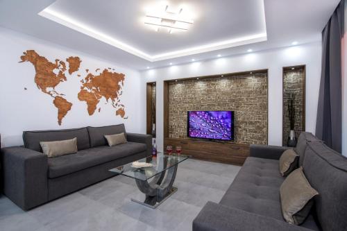 Posezení v ubytování TWIN'S HOME LUXURY SUITES