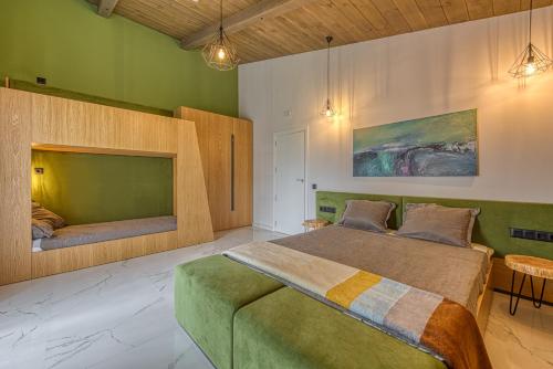 Postel nebo postele na pokoji v ubytování Pirin Style Villa & Spa