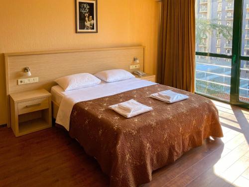 Letto o letti in una camera di Batesta Hotel
