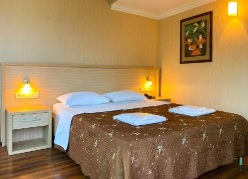 Letto o letti in una camera di Batesta Hotel