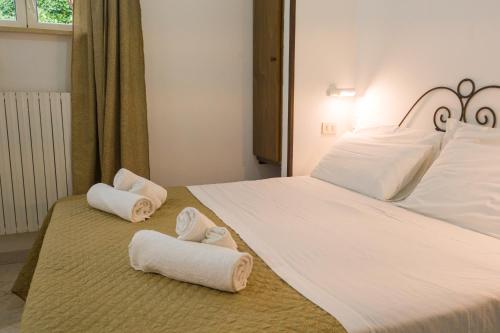 Katil atau katil-katil dalam bilik di Litto Appartamenti