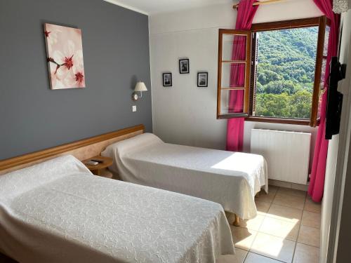 Postel nebo postele na pokoji v ubytování Apparthotel Le Porto