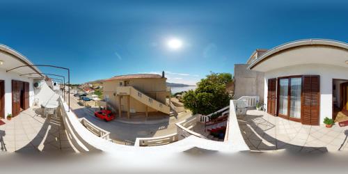 an aerial view of a building with a playground at Big Pag apartament close to Zrće beach in Metajna