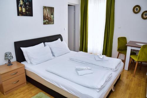 Giường trong phòng chung tại Guesthouse Marivo