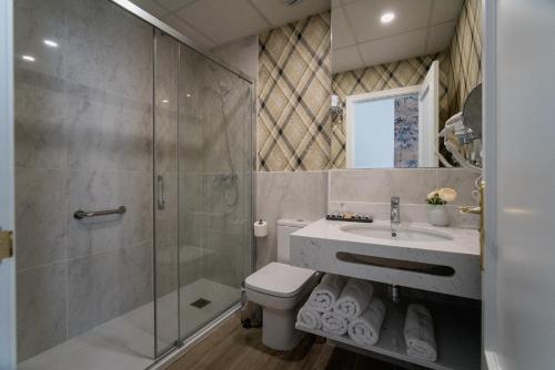 Koupelna v ubytování Apartamentos Abreu Suites