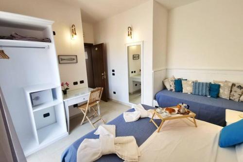 Χώρος καθιστικού στο Loft Exotic - 100 metri dalla spiaggia e dal mare di Fontane Bianche