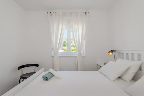 Postel nebo postele na pokoji v ubytování New and chic place near Old Town of Trogir