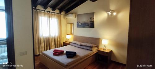 A bed or beds in a room at Oxy Holiday Home
