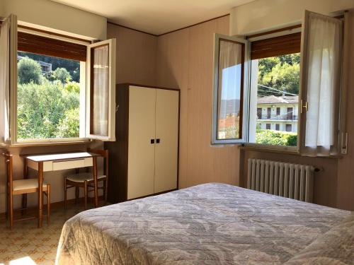 Postel nebo postele na pokoji v ubytování Hotel Zanetti
