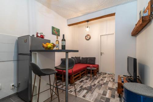 Televízia a/alebo spoločenská miestnosť v ubytovaní Studio Apartman Duje