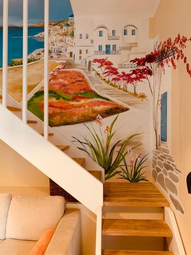 a stairwell with a mural of a positano street at Kuninga Old Town Resident in Pärnu
