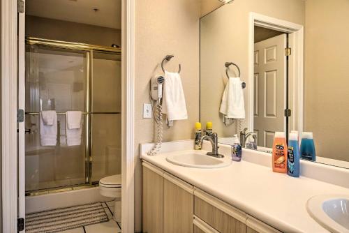 a bathroom with a sink and a shower at Champions Retreat Condo Near 76 Strip in Branson