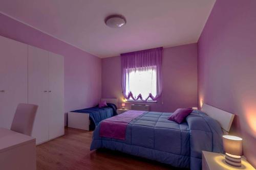 Posteľ alebo postele v izbe v ubytovaní BB Villa Giacomina