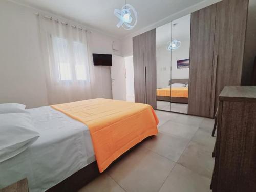 Posteľ alebo postele v izbe v ubytovaní Villa Zizzari A Due Passi Dal Mare