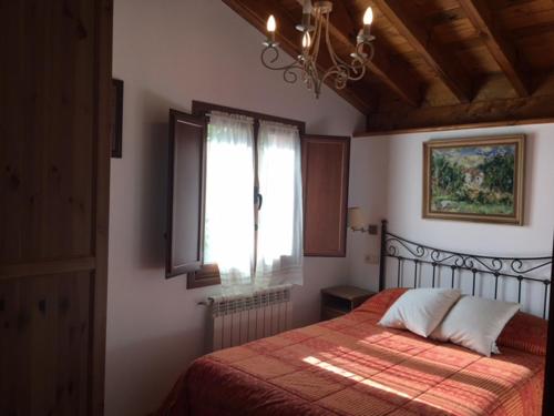 Postel nebo postele na pokoji v ubytování VILLA ISABEL
