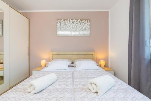 Postel nebo postele na pokoji v ubytování Apartman Bura