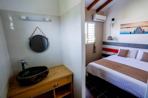 Llit o llits en una habitació de La cabane du pêcheur