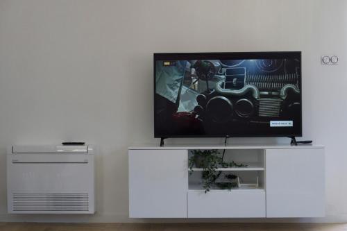 Телевізор і / або розважальний центр в APARTMAN AURORA