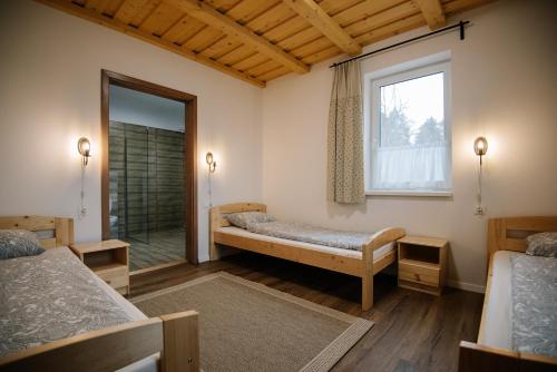 Tempat tidur dalam kamar di Kőszikla Kulcsosház