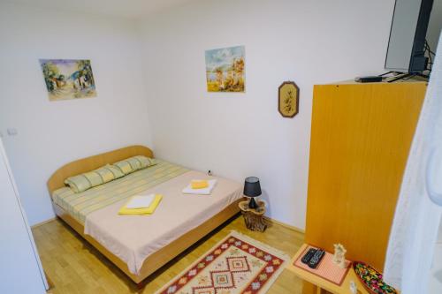 Postel nebo postele na pokoji v ubytování Bovanski Vidikovac