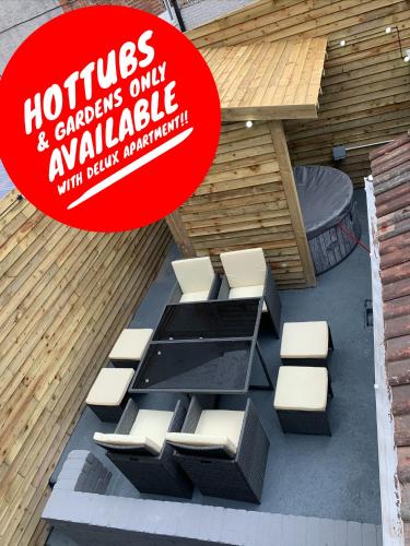 a sign that readshouses and gardens only available with extra furniture at Albert Hottub & Jacuzzi Apartments in Blackpool