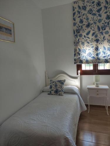 Postel nebo postele na pokoji v ubytování Apartamento Los Jardines San Miguel