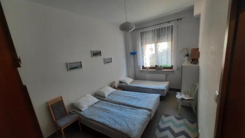 En eller flere senger på et rom på Pelican - Czarny Dwór B
