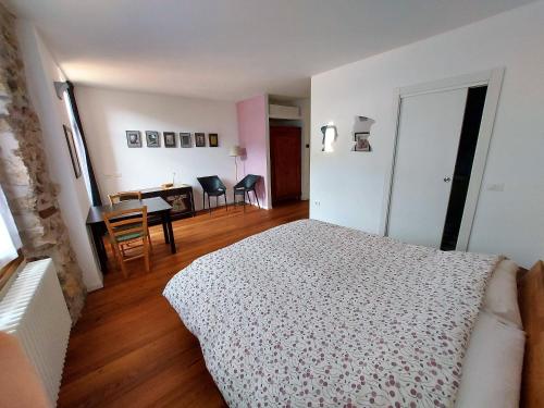 Katil atau katil-katil dalam bilik di La Piazzetta di Canale B&B