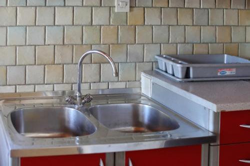 Kuchyň nebo kuchyňský kout v ubytování Apartman PJER 1