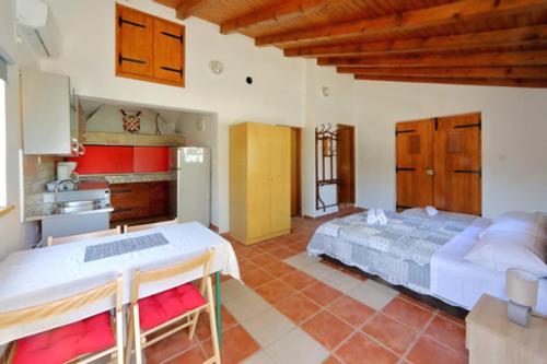 Postel nebo postele na pokoji v ubytování Apartman PJER 1