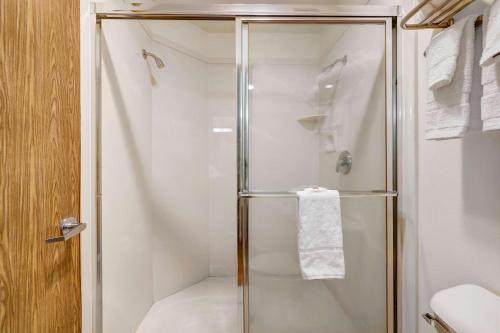 a shower with a glass door in a bathroom at Motel 6-Beaver, UT in Beaver
