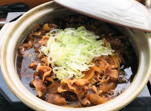 a bowl of food with onions on top of it at Chisun Grand Nagano in Nagano