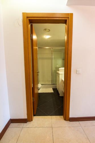 an open door to a bathroom with a toilet at CTS Elysium Residence Taksim in Istanbul