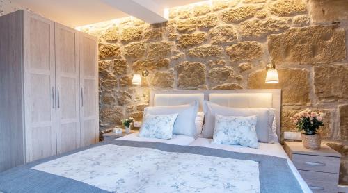 Postel nebo postele na pokoji v ubytování Apartamentos Turísticos de La Vega