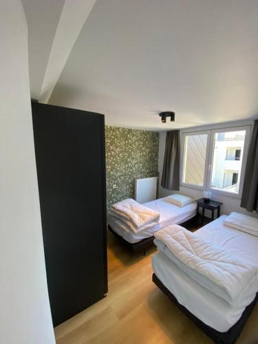 Postel nebo postele na pokoji v ubytování Villa Maredan