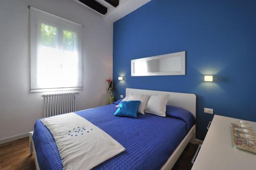Krevet ili kreveti u jedinici u okviru objekta Cannaregio Suite - Colleoni Holidays
