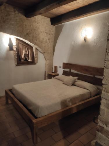 A bed or beds in a room at B&B I Martelli