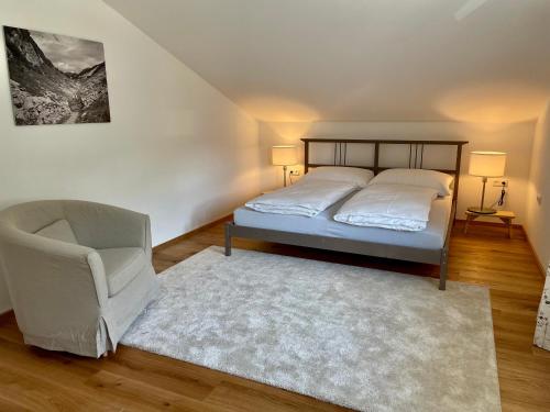 Posteľ alebo postele v izbe v ubytovaní Moderne Ferienwohnung Hubert Neuper im Zentrum von Bad Mitterndorf